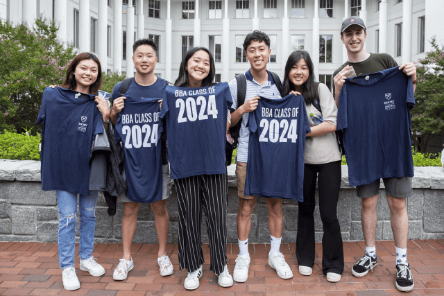 BBA Class of 2024 Students with Tshirts Goizueta BBA students from the class of 2024 pose with t-shirts at a social event.